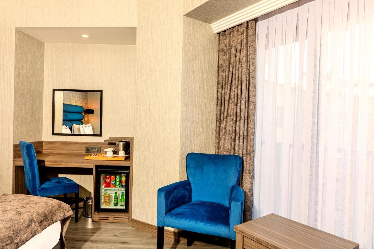 Demiray Hotel Old City 伊斯坦布尔 外观 照片 A room at the hotel